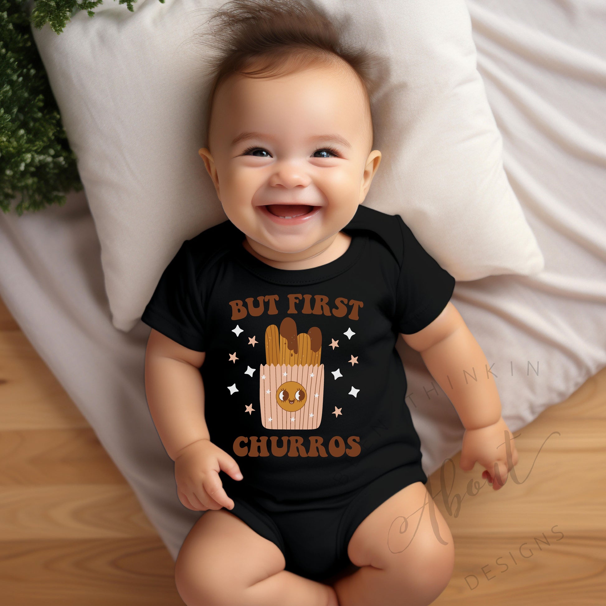 BUT FIRST CHURROS BABY BODYSUIT BLACK